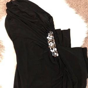 One- shoulder black evening gown